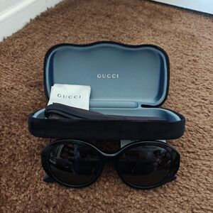 Gucci Dark Sunglasses with Elegant Case